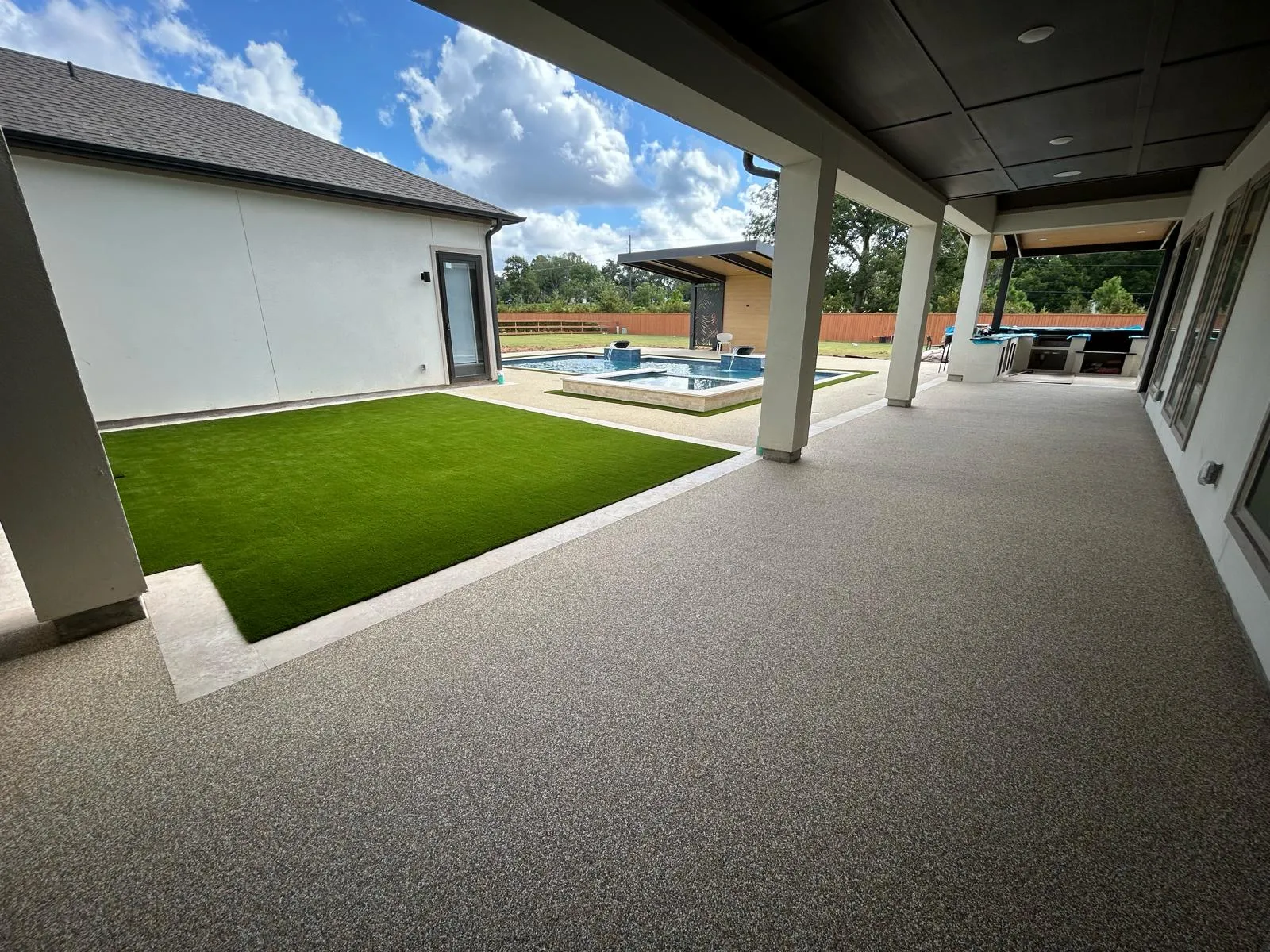 Family pool deck with TPV rubber surfacing