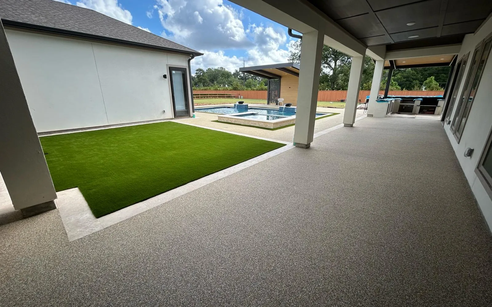 Custom TPV rubber pool deck surface at a Sunnyvale, Texas home