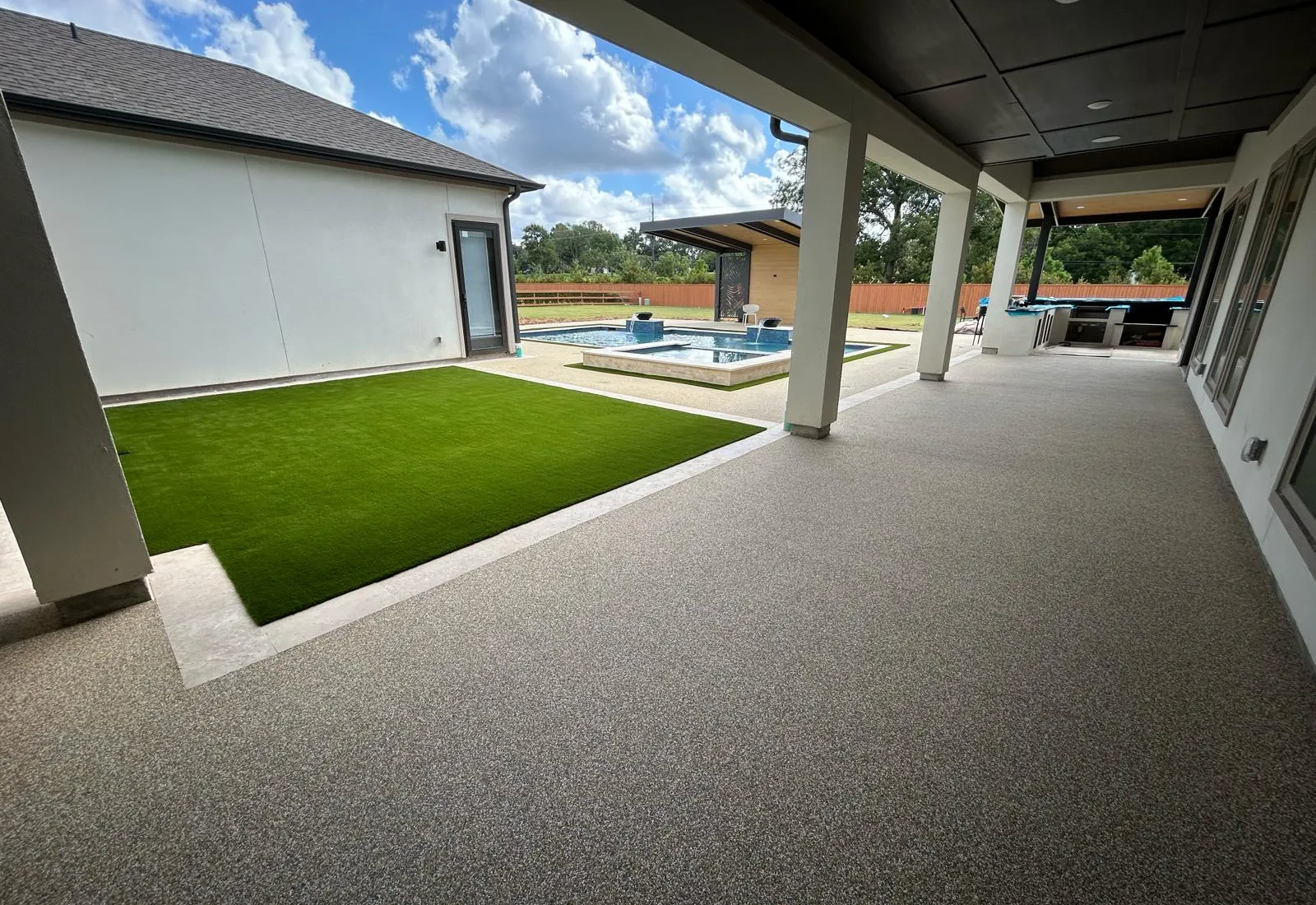Luxury family pool deck with TPV rubber surfacing